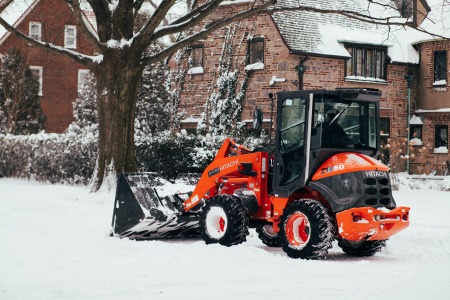 snow removal tip: tractors are very effective to plow snow on sidewalks